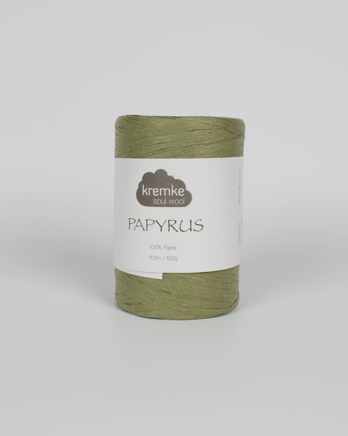 A olive green ball of raffia yarn on a white background