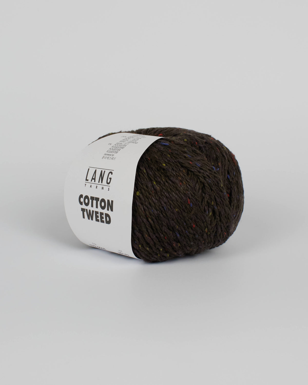 A brown black ball of yarn with multicoloured tweed flecks on a white background