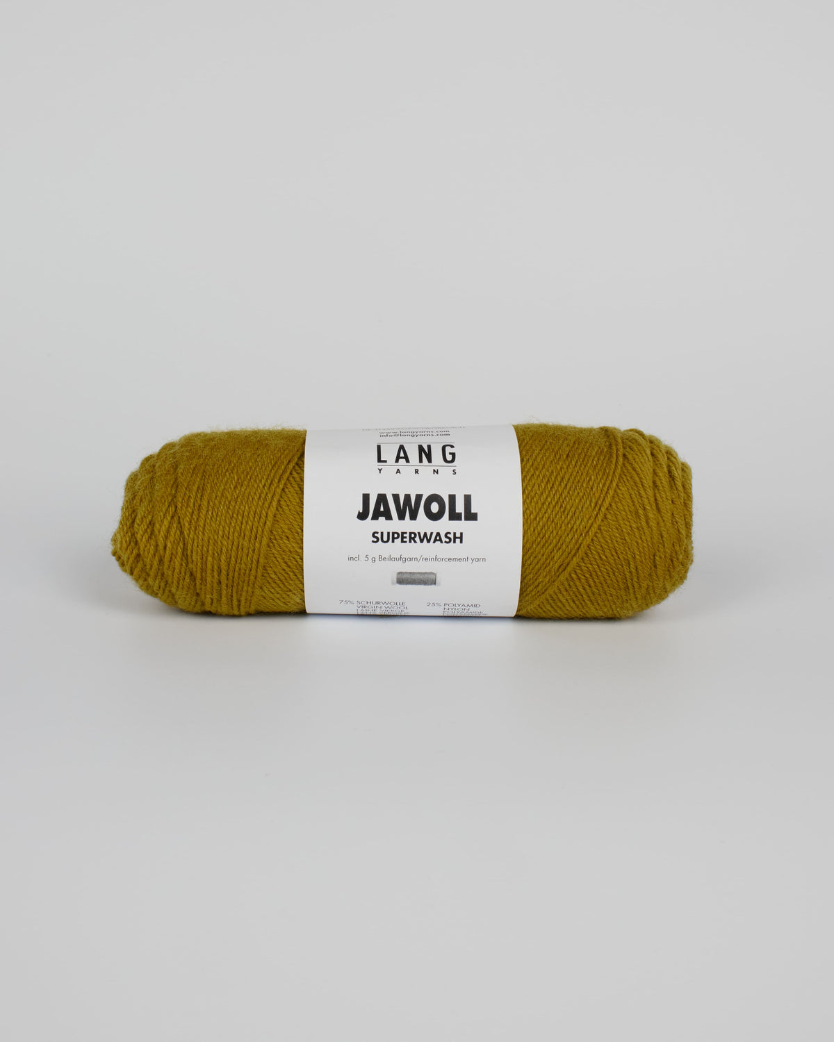 A mustard ball of yarn on a white background