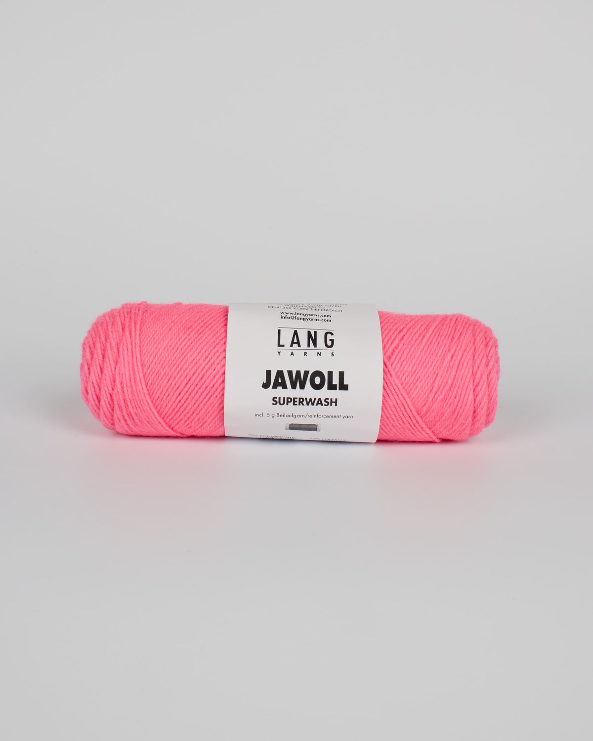 A neon pink ball of yarn on a white background