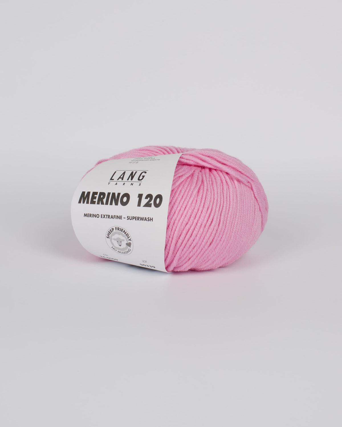 A bubblegum pink ball of yarn on a white background