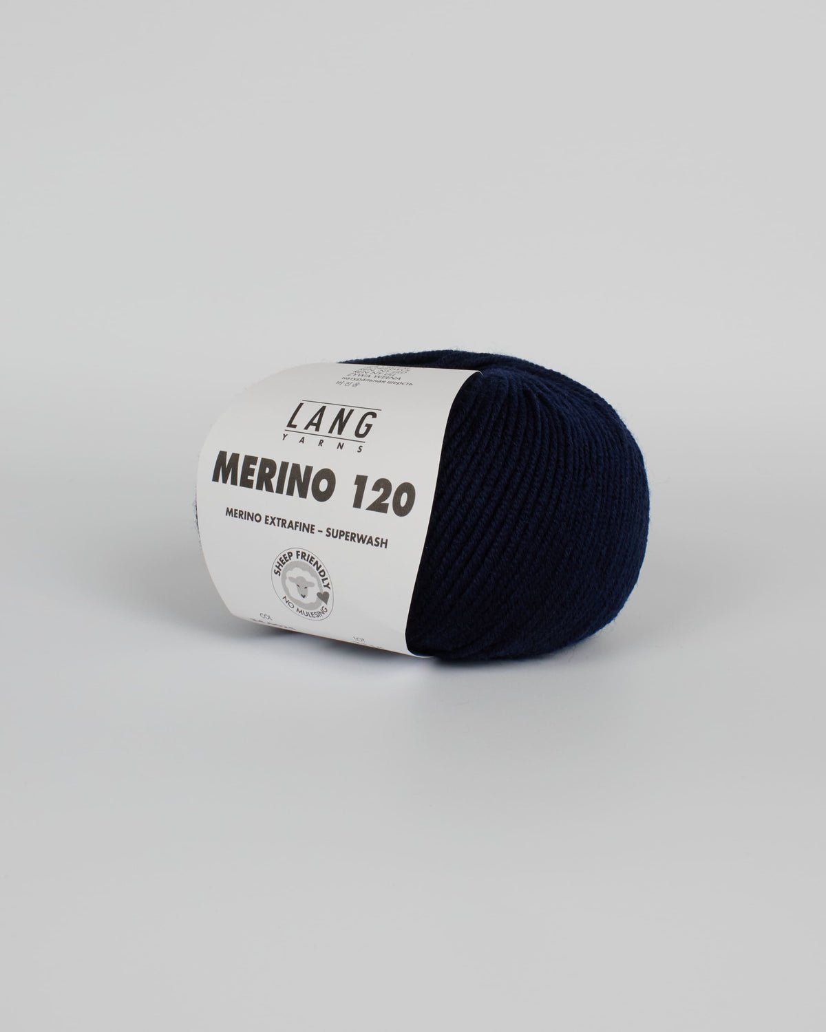 A navy blue ball of yarn on a white background