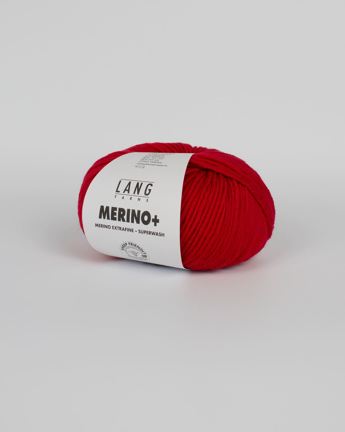 A red ball of yarn on a white background