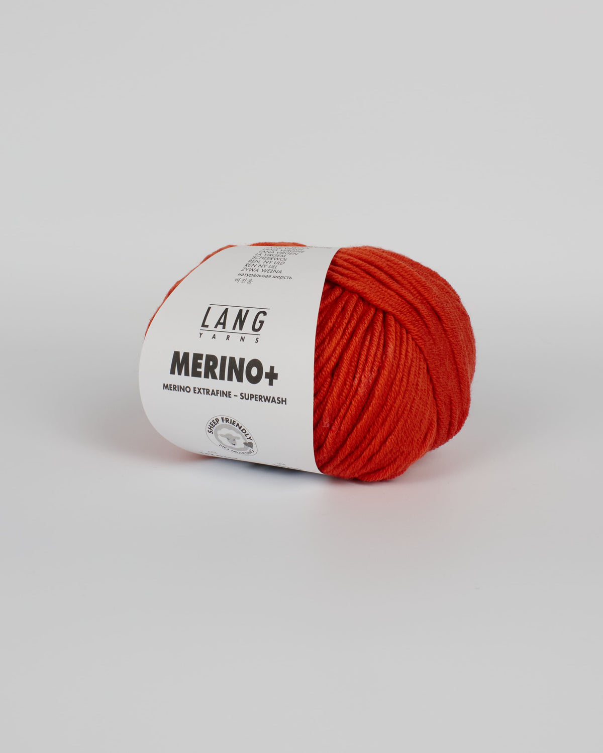 A red ball of yarn on a white background