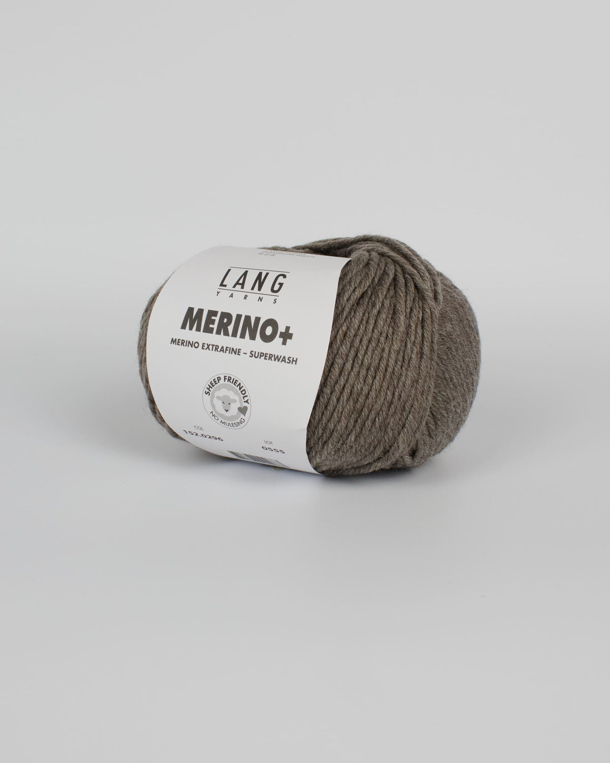 An elephant grey ball of yarn on a white background
