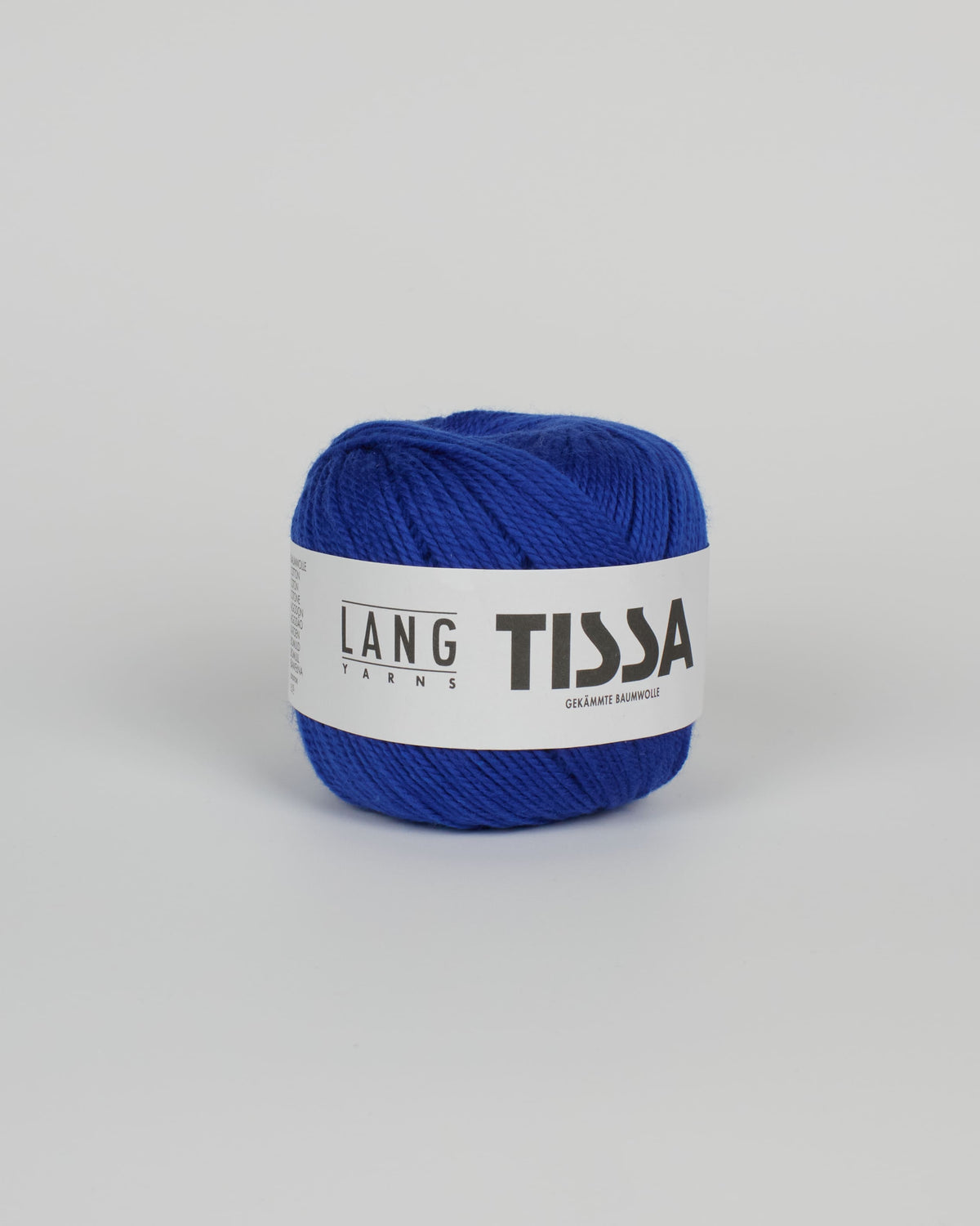 A royal blue ball of yarn on a white background