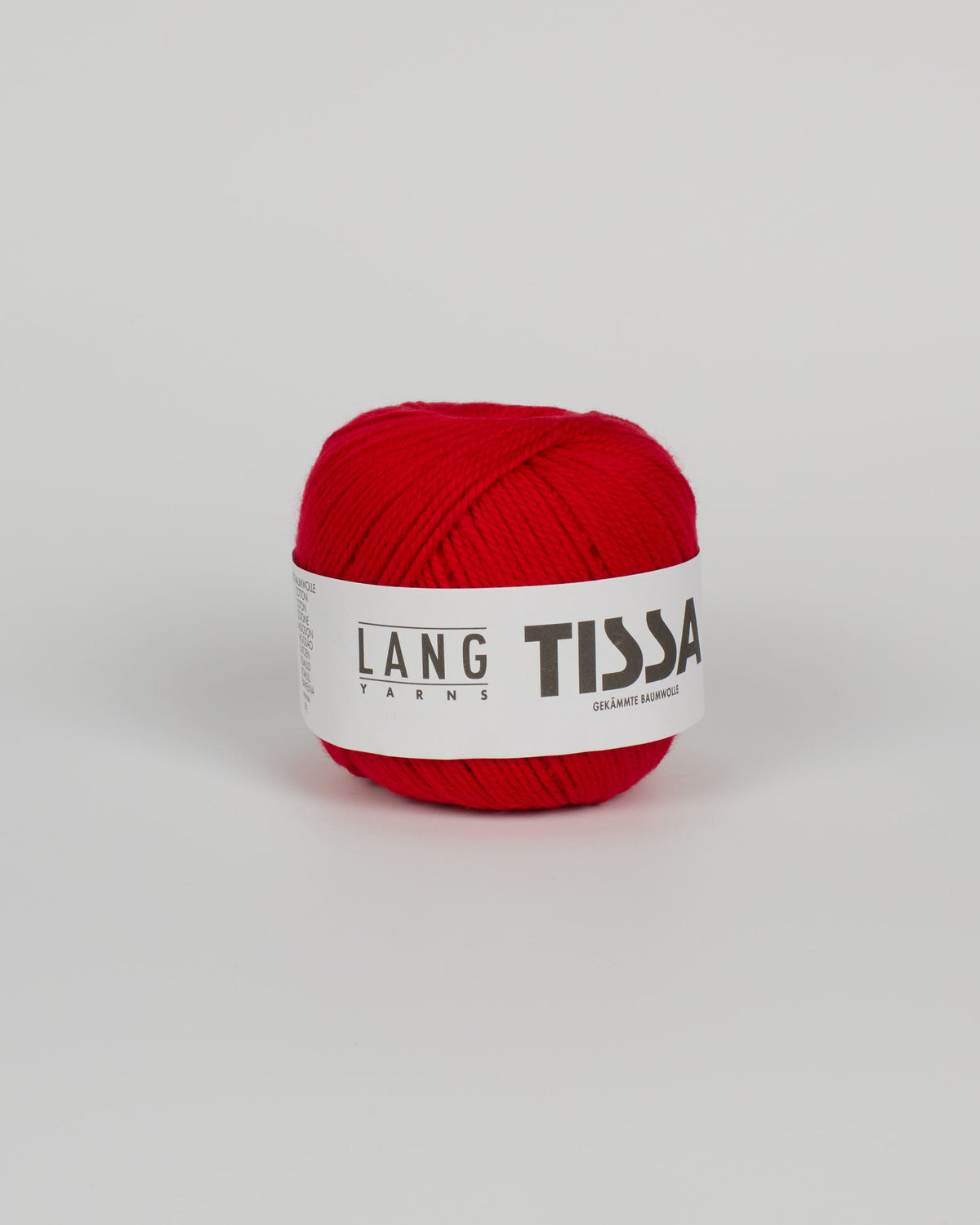A red ball of yarn on a white background